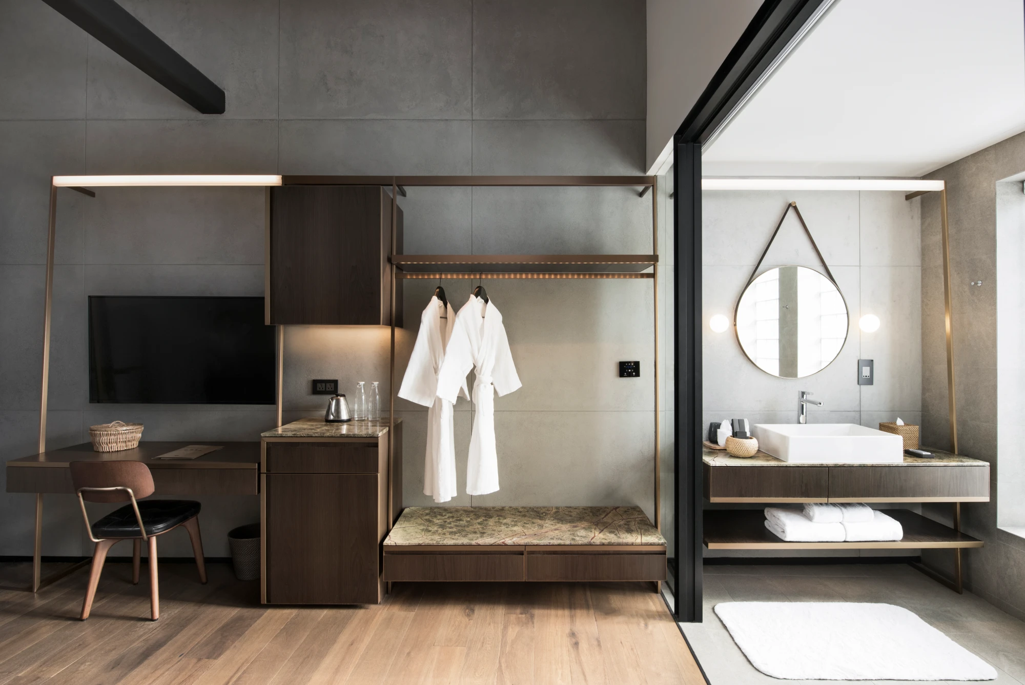 hotel wardrobe next to the bathroom sink