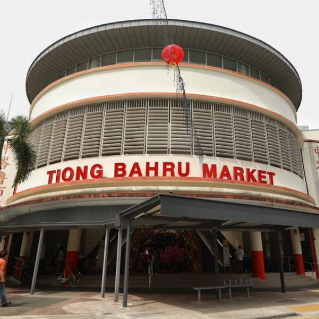 cylindrical building exterior with a signboard showing "tiong bahru market"