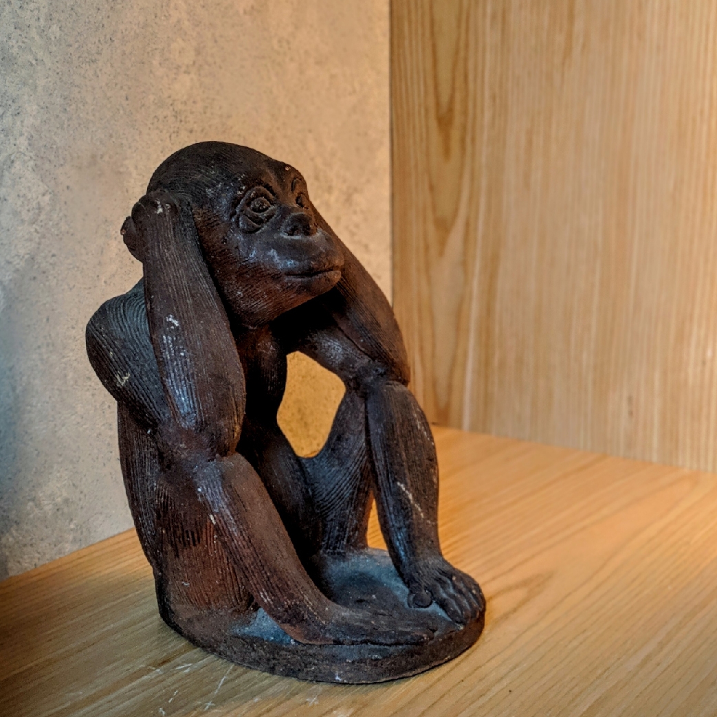 ARTATDEN-03-1 statue of a monkey sitting down while covering its ears